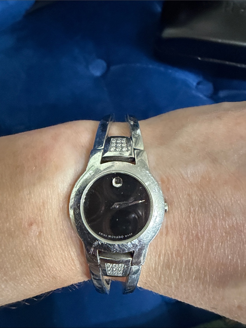 Movado Silver-Tone Watch with Black Dial and Bracelet Accents
